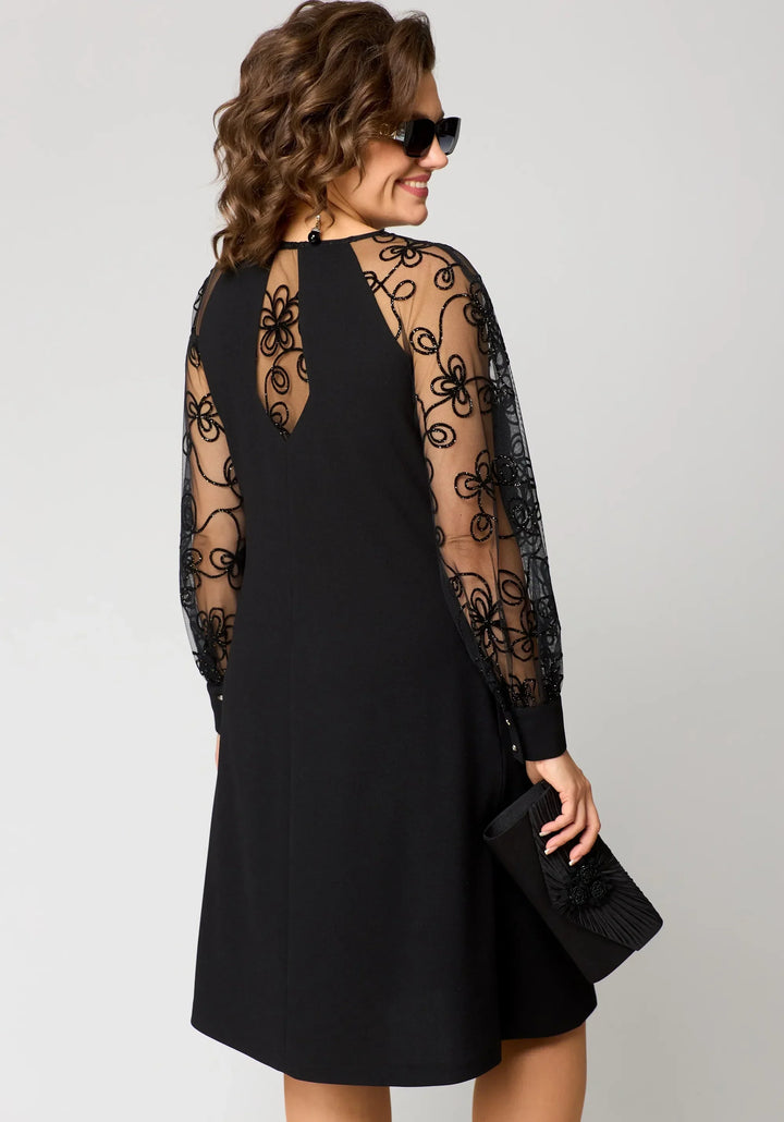 Edyth™ Elegante Spitzenkleid" could be rewritten as "Edyth™ Elegant Lace Dress.