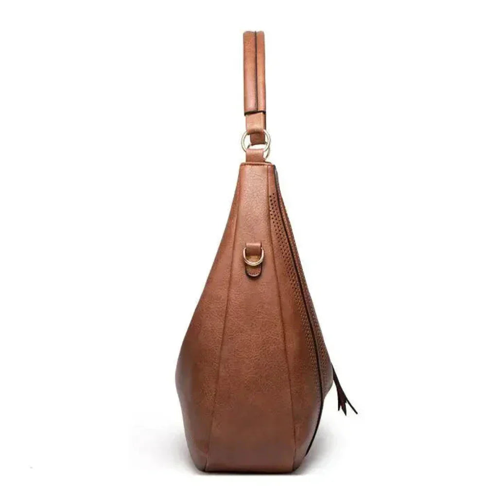 Minervas klassische Vielseitigkeit | Vintage Tasche