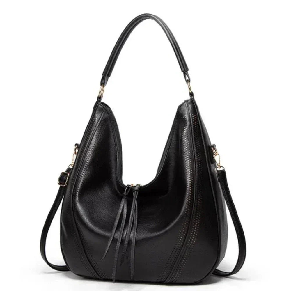 Minervas klassische Vielseitigkeit | Vintage Tasche