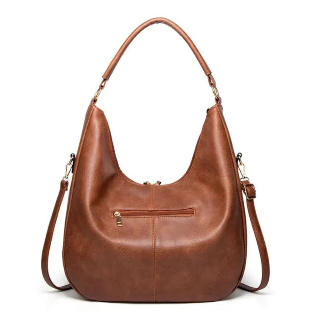 Minervas klassische Vielseitigkeit | Vintage Tasche